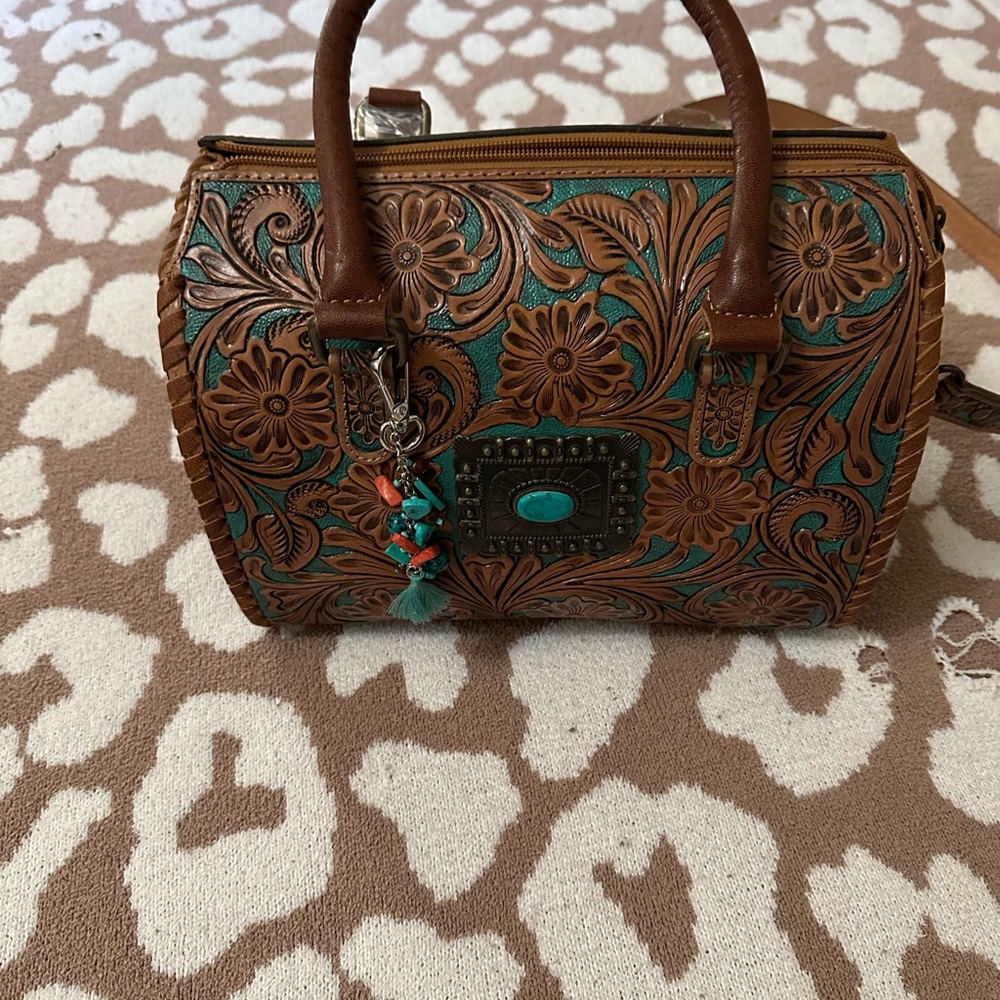 Beautiful medium brown and Teal Floral tooled leather Handbag.